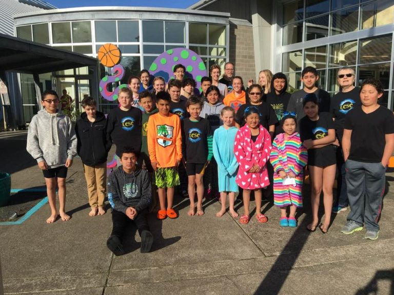 Lincoln City swimmers prove there’s no place like home
