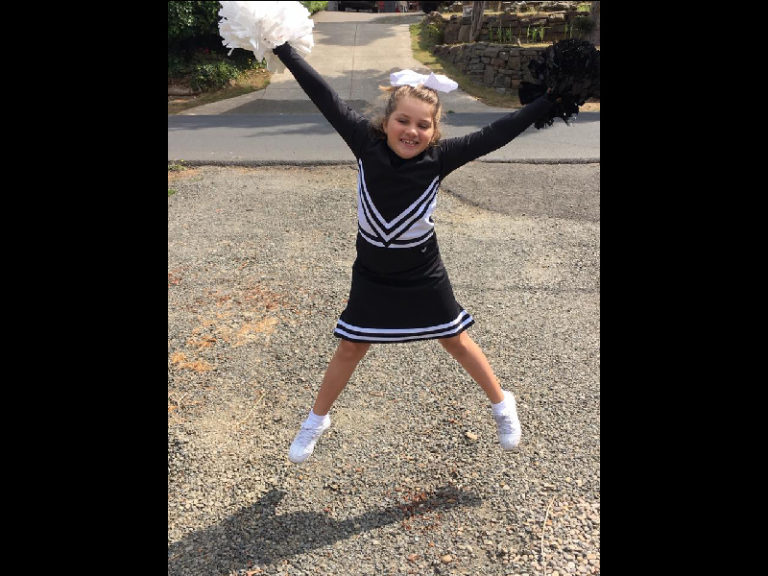 Young cheerleaders make spirited debut at soccer competition