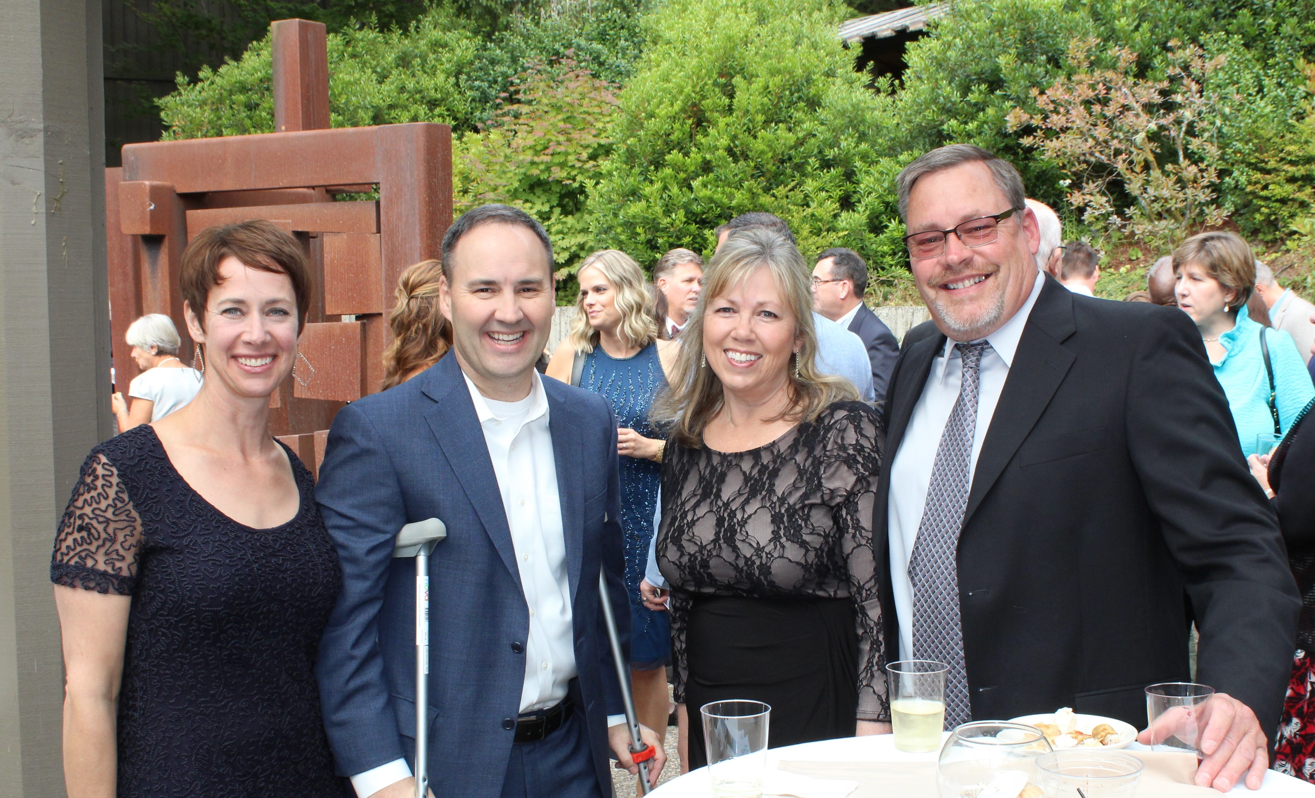 Among those enjoying the Summer Gala are, from left, Kerry and Doug Boysen, President and CEO of Samaritan Health Services; Virginia Riffle, COO of Samaritan North Lincoln Hospital, and her husband, Bob Riffle.