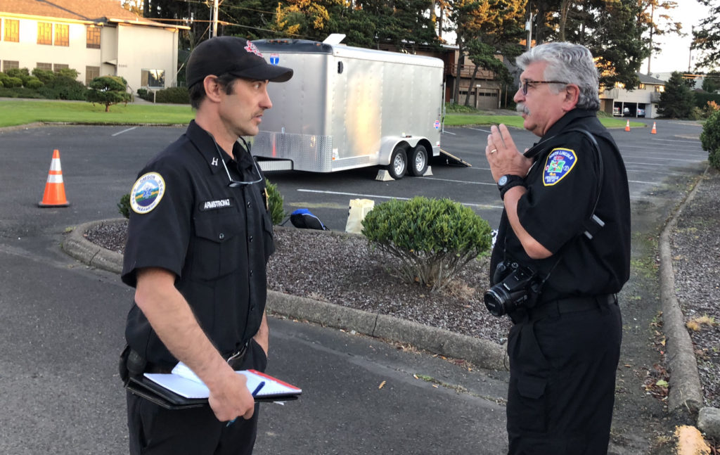 District Captain Jim Kusz, right, has been suspended as the departments public information officer