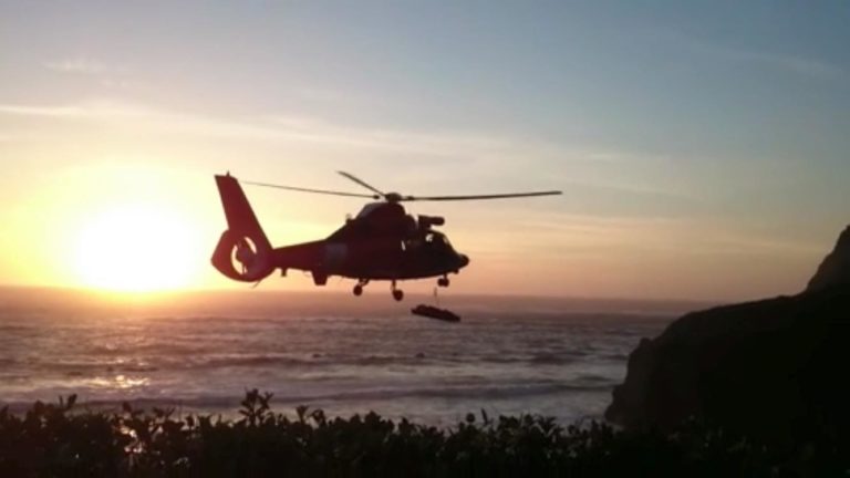 Coast Guard airlifts stranded sailors in Yaquina Bay