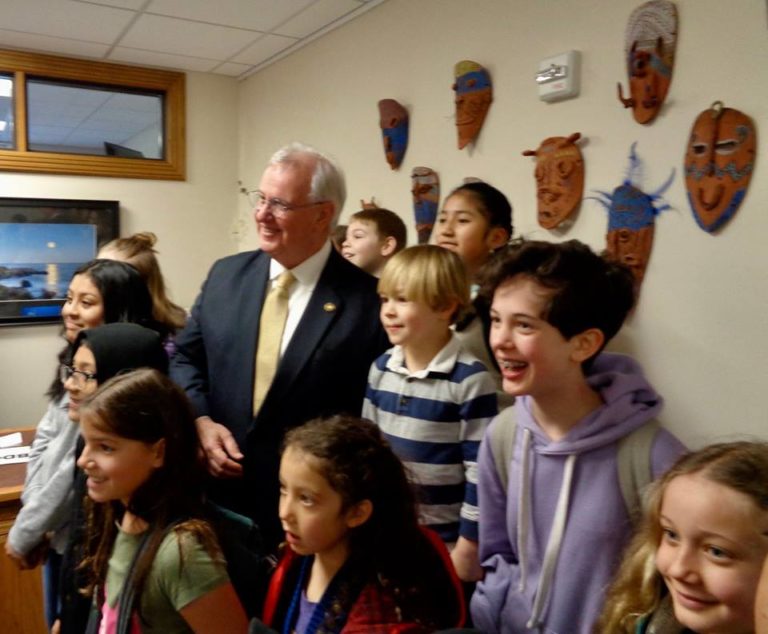 Rep. Gomberg unmasks St. James Santiago students’ artwork at Capitol