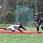 Smith dives back on a pick off attempt