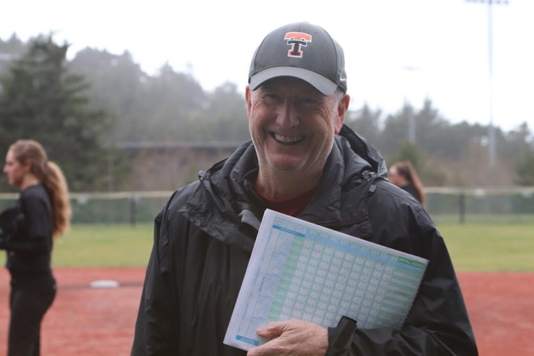 Tigers take opener, drop second game for league softball split