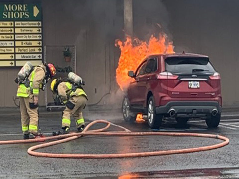 VIDEO: NLFR responds to car fire in Safeway parking lot in Lincoln City
